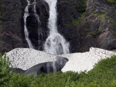 Waterfall with large snow masses near the Whiiter tunnel