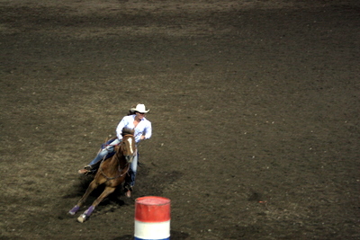 Barrel Racing at the Cody Night Rodeo